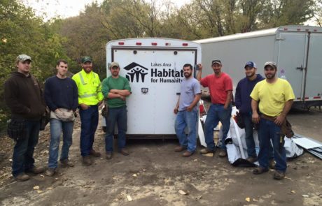 Lakes Area Habitat for Humanity Trailer with Workers